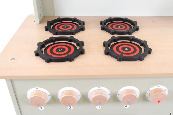 Vier kookpitten met draaibare knoppen