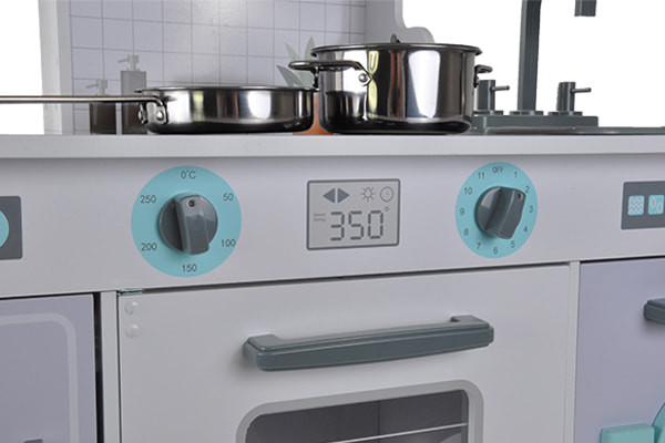 Draaiknoppen boven de oven.